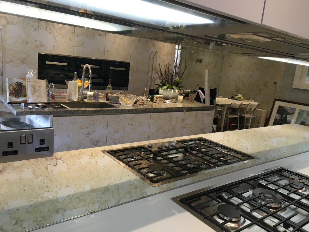 Mirror glass splashback in Carshalton luxury kitchen